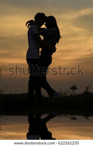 Silhouette of a couple on evening.