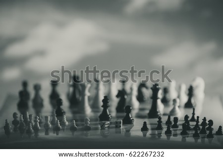 Chess strategy concept is on the bright background. Abstract background of business concept . Selective focus shallow depth field. Monochrome