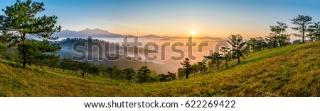 Amazing sunrise at Golden Hill , Golden Valley in Da Lat City, Famous View In Da Lat City Da Lat is highland city fog in the morning. Da Lat is one of the beautiful and the famous city in Viet Nam. Royalty-Free Stock Photo #622269422