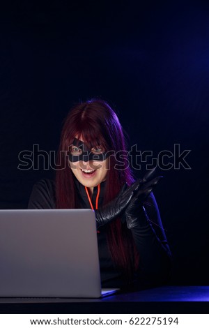 Girl thief in black mask