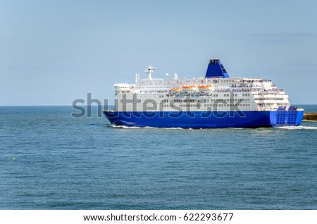 Huge Ferry Leaving a Harbour on a Clear Spring Day