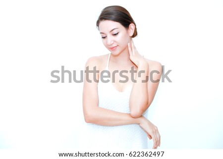 Beautiful Young Woman with Clean, Fresh, Glow, and pefect Skin. Beauty and skincare concept. Spa. Isolated over white.Selectived focus at her eyes.