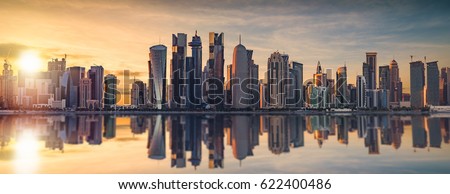 The skyline of Doha, Qatar during sunset Royalty-Free Stock Photo #622400486