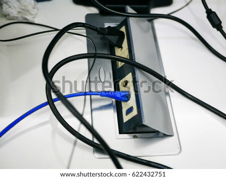 Power plug on white table