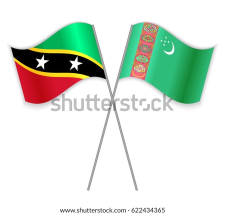 Kittitian and Turkmen crossed flags. Saint Kitts and Nevis combined with Turkmenistan isolated on white. Language learning, international business or travel concept.