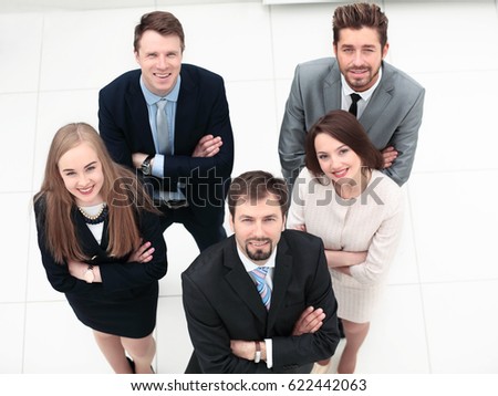 Business colleagues looking at camera in the office