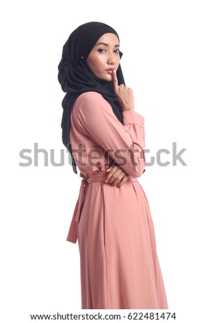 beautiful Muslim young woman of a photography studio with white background