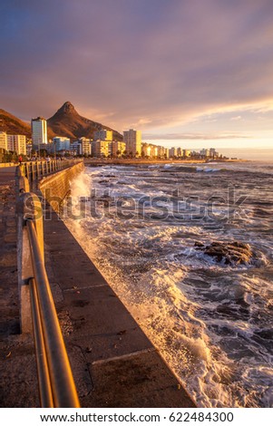 Sea Point sunset with Lions Head in Cape Town Royalty-Free Stock Photo #622484300