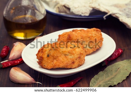 cod fish croquete on plate