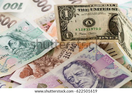czech koruna currency and one dollar bill concept photo