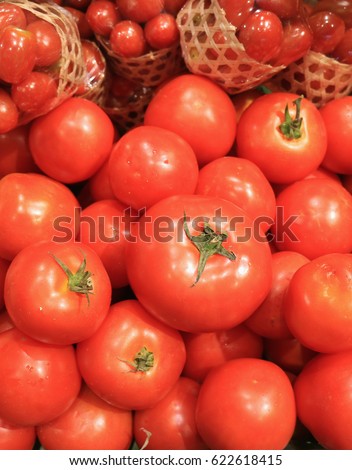 Pile of Vibrant Red Ripe Tomatoes, Vertical Picture 