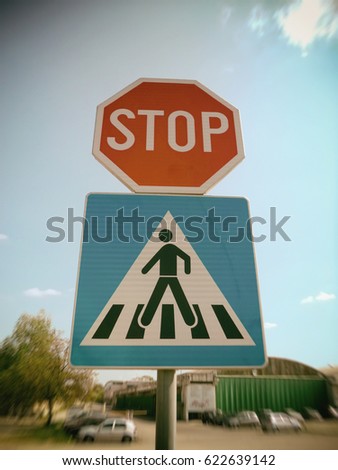 Traffic sign. stop, crosswalk, blurred image                              