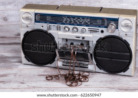 Retro radio-cassette player.Dusty old cassettes.Vintage style .	
