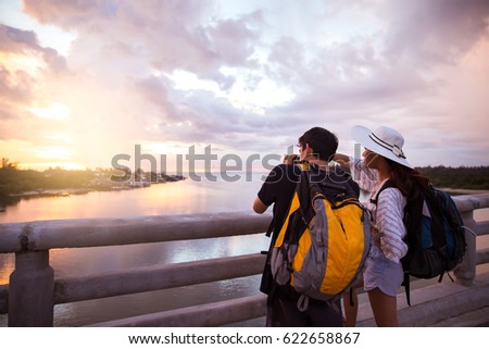 traveler photographing  Asia at sunrise