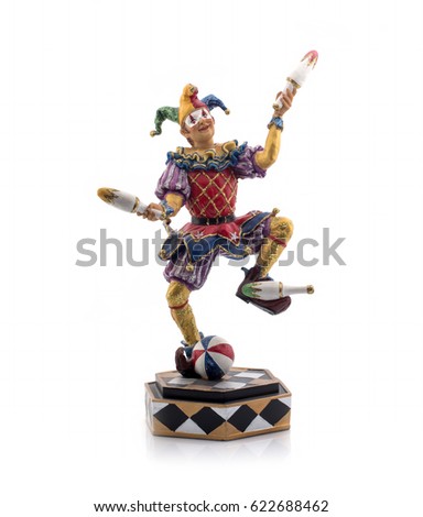 Clown with maces made of ceramics on a white background. Isolated