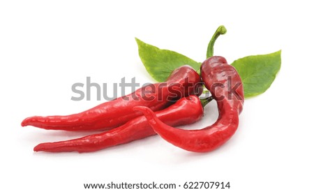 Three peppers isolated on a white background.