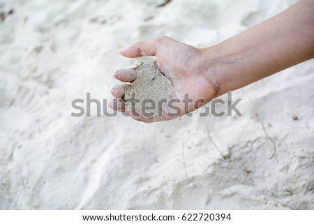 Time Sand running through hand