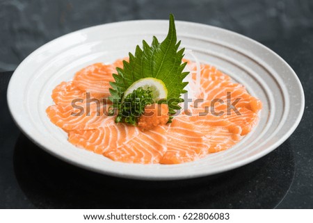 Raw fresh salmon sashimi in plate - Japanese and healthy food style