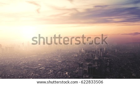 Picture of aerial view over city of Jakarta, Indonesia. Shot at sunset time