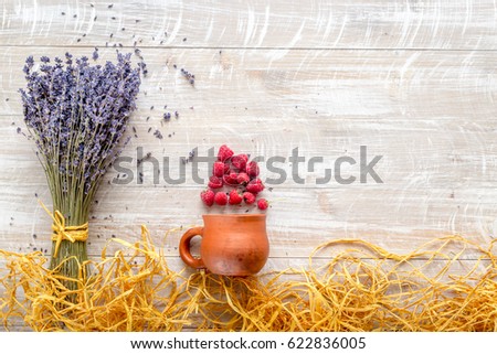 dry lavander design with raspberry and straw wooden background top view mockup