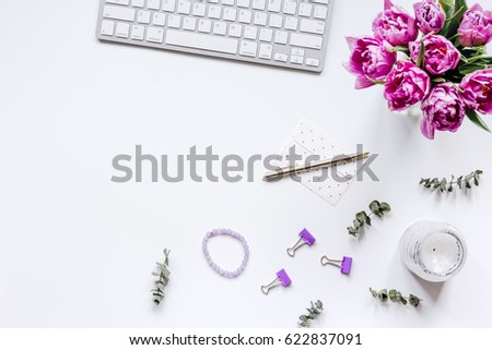 Woman office desk with flowers on white background top view mockup