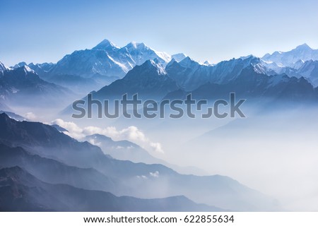 Daylight view of Mount Everest, Lhotse and Nuptse and the rest of Himalayan range from air. Sagarmatha National Park, Khumbu valley, Nepal. Royalty-Free Stock Photo #622855634