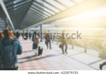 people walking in the street, (blur focus)
