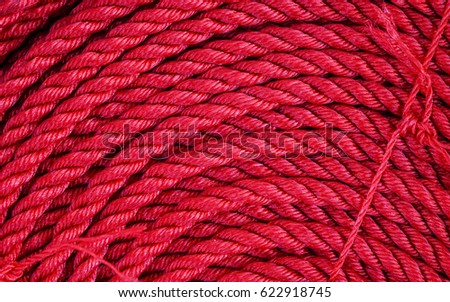 Red rope in piles at the market in Kowloon, Hong Kong. Close up.