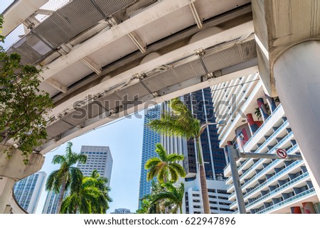 Metrorail and city skyscrapers, Miami - FL.