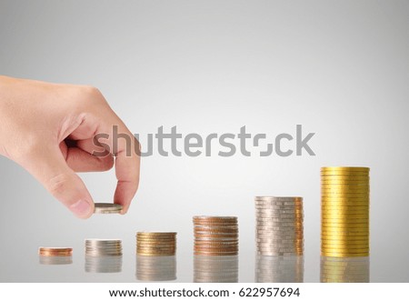 Hand human hand putting coin to money, business ideas