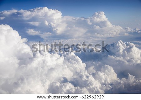 Nature lighting, Cloud  from window of airplane with beautiful sky.(Selective Focus)