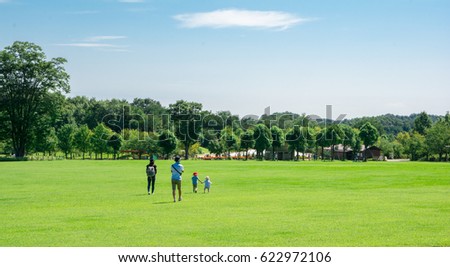 A family with a park Royalty-Free Stock Photo #622972106