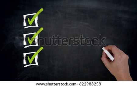 Checklist with Copyspace Hand writing on blackboard. Royalty-Free Stock Photo #622988258