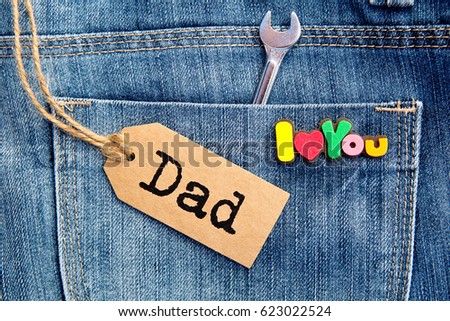 I Love You Dad on blue Denim background with tag
