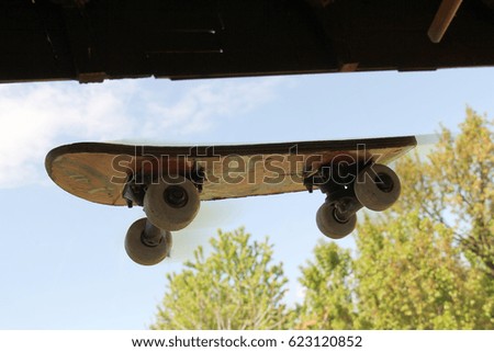 Skateboard flying in the air old school style