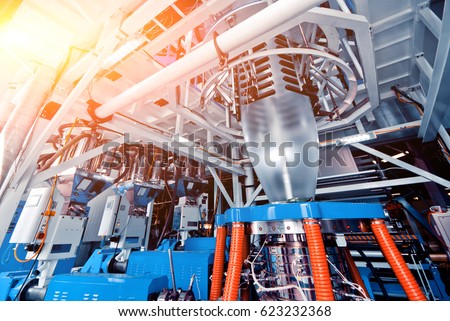 Automated production line in factory. Plastic bag manufacturing process Royalty-Free Stock Photo #623232368