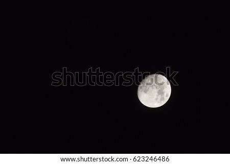 Moon shining glowing light the night sky