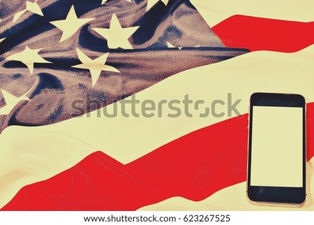 Smartphone and Us flag. Vintage style
