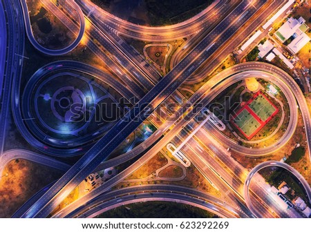 Road Beautiful Aerial View of business intersection top view at night
