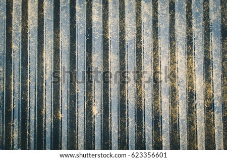 Dark grated metal pattern for abstract background