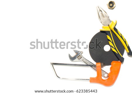 Brilliant keys and pliers on a white background.