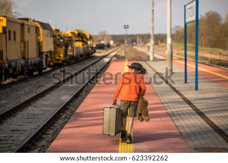  waiting at the railway station, Vacation trip by train 
