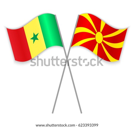 Senegalese and Macedonian crossed flags. Senegal combined with Macedonia isolated on white. Language learning, international business or travel concept.