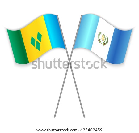 Vincentian and Guatemalan crossed flags. Saint Vincent and the Grenadines combined with Guatemala isolated on white. Language learning, international business or travel concept.