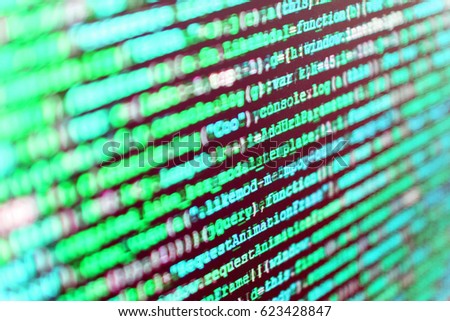 PHP syntax highlighted. Database bits access stream visualisation. Desktop PC monitor photo. Digital technology on display. PC software creation business. Programming code typing. 
