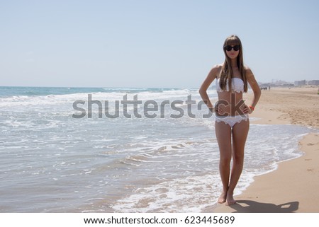 The girl who came on vacation in Spain. Coast of the Mediterranean Sea