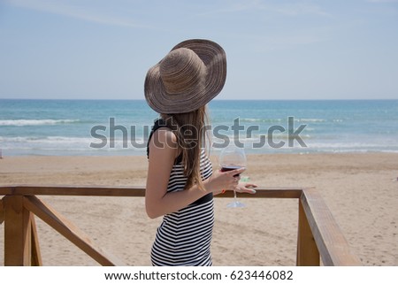 The girl who came on vacation in Spain. Coast of the Mediterranean Sea