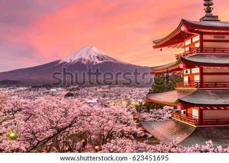 Fujiyoshida, Japan at Chureito Pagoda and Mt. Fuji in the spring with cherry blossoms. Royalty-Free Stock Photo #623451695