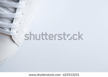 One Sport sneaker on white background. Top view