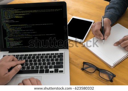 "Developer Team Working Laptop Computer Mobile Application Softwareand Web Design Online Technology Content , Web script , laptop display
"